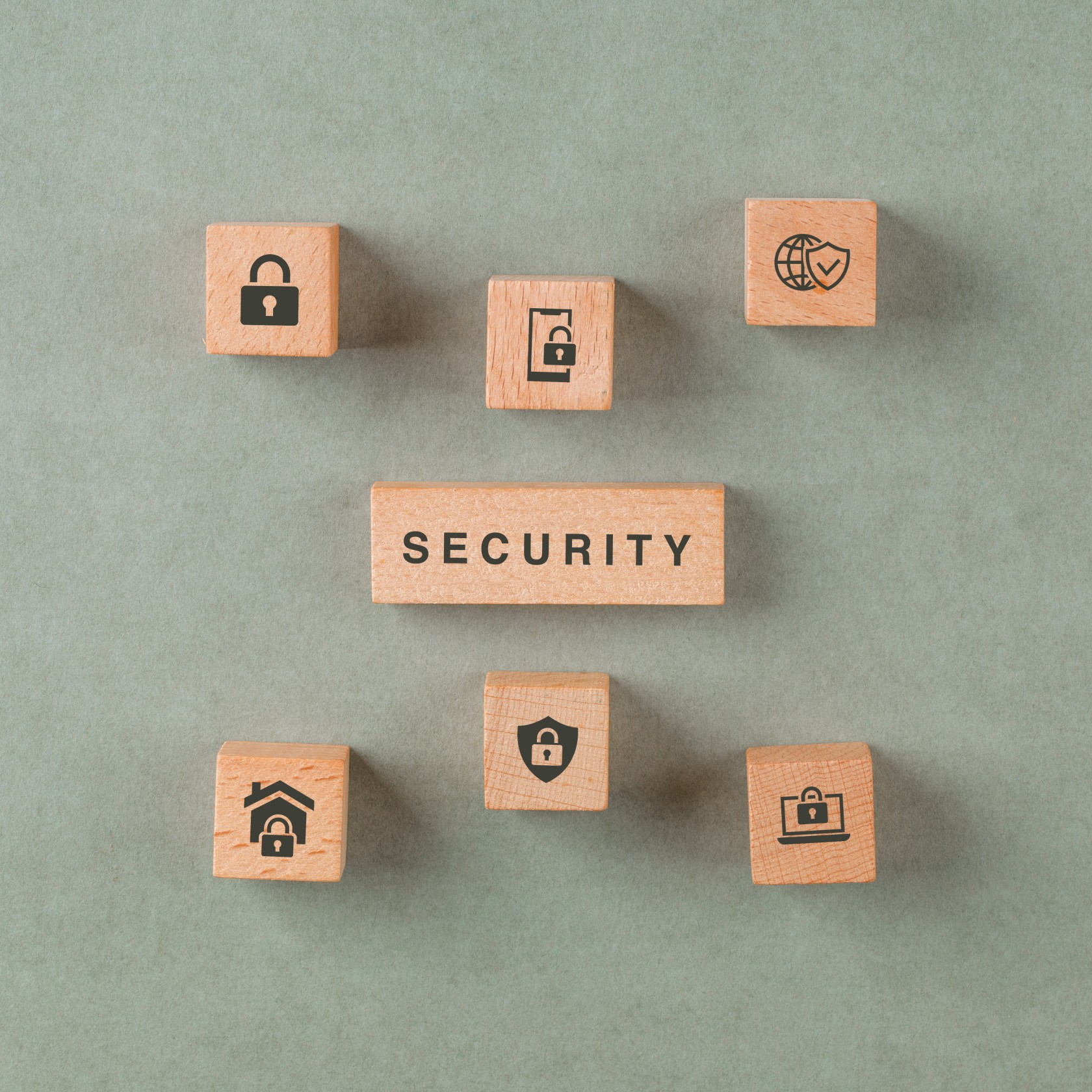 security-concept-with-wooden-blocks-with-icons.jpg